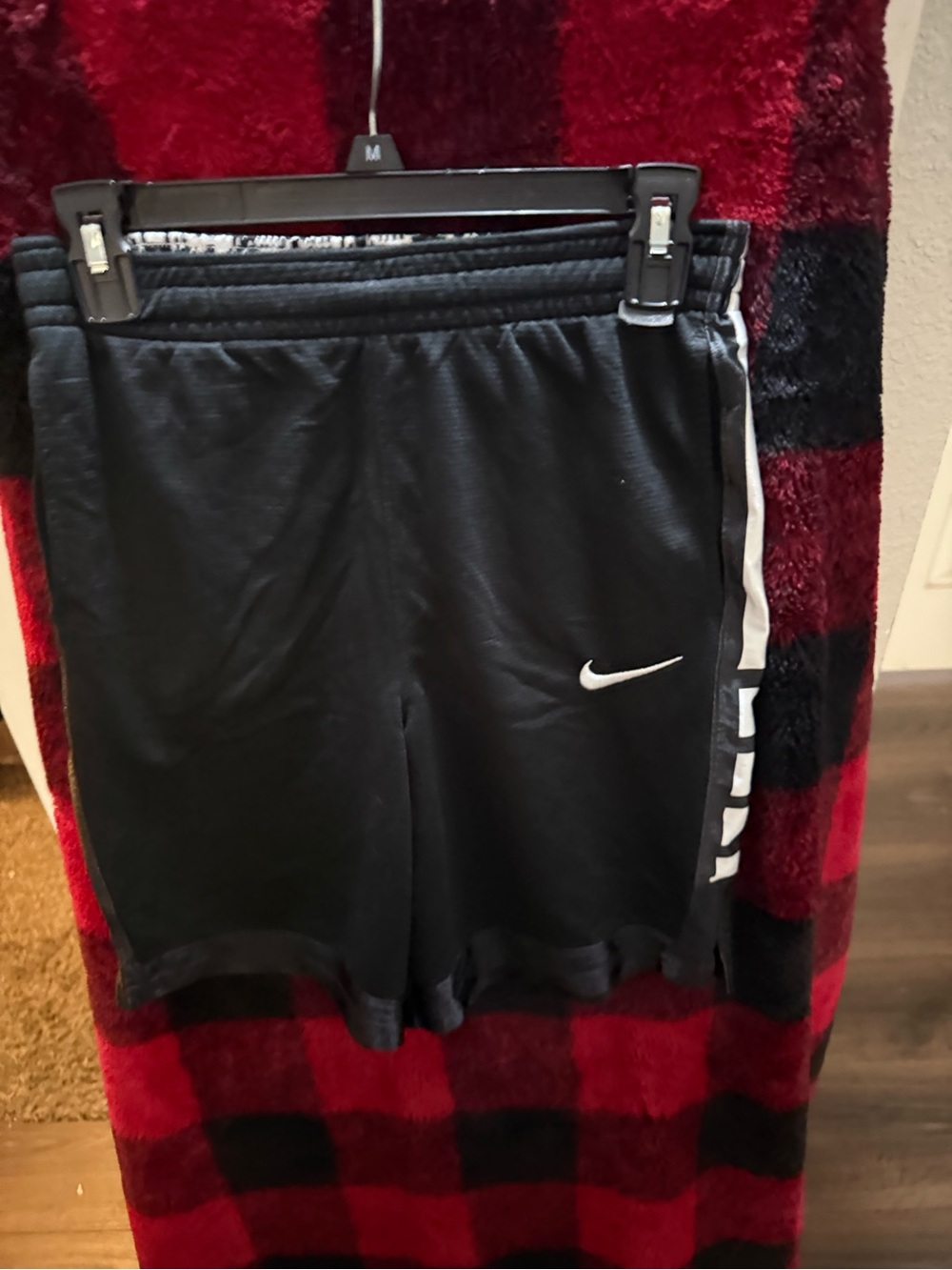 Nike Black Kids Athletic Shorts with White Swoosh and Side Stripe